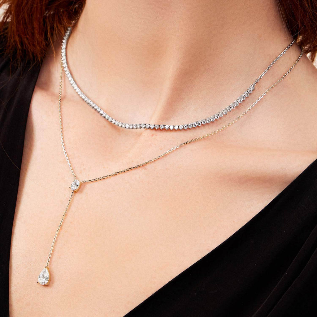The Ecksand Oval and Pear-Cut Diamond Necklace shown with  in 