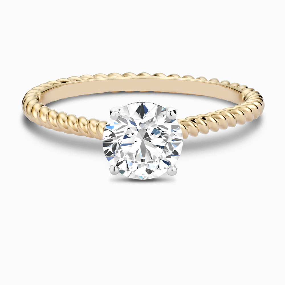 The Ecksand Twisted Diamond Solitaire Engagement Ring shown with Round in 14k Yellow Gold