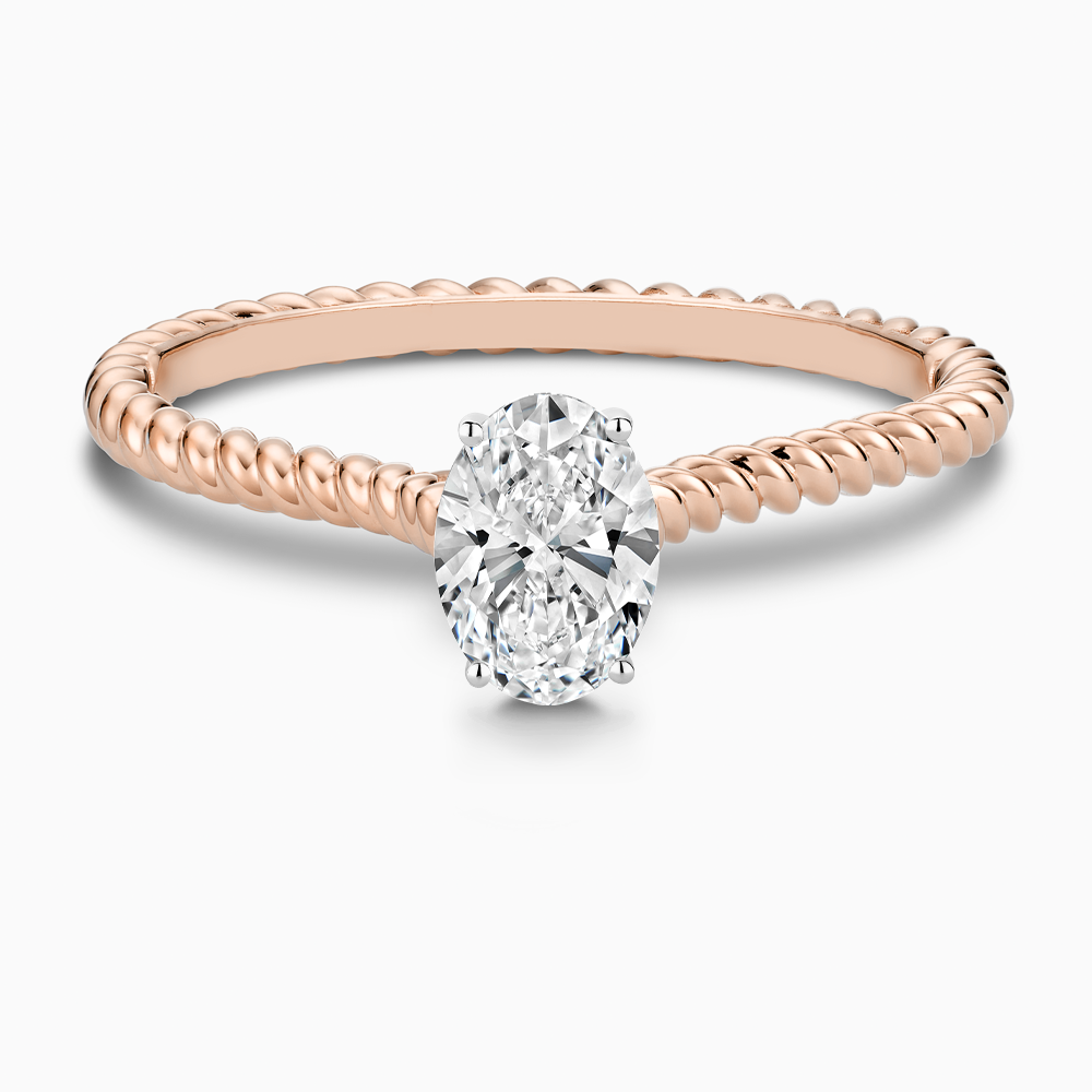 The Ecksand Twisted Diamond Solitaire Engagement Ring shown with Oval in 14k Rose Gold