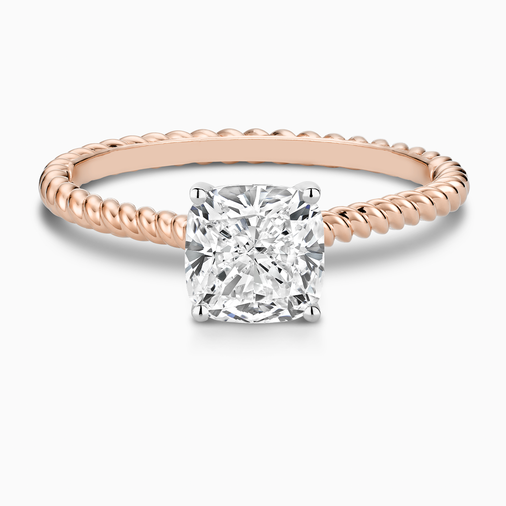 The Ecksand Twisted Diamond Solitaire Engagement Ring shown with Cushion in 14k Rose Gold