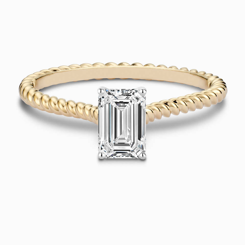 The Ecksand Twisted Diamond Solitaire Engagement Ring shown with Emerald in 14k Yellow Gold