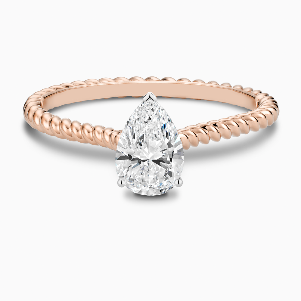 The Ecksand Twisted Diamond Solitaire Engagement Ring shown with Pear in 14k Rose Gold