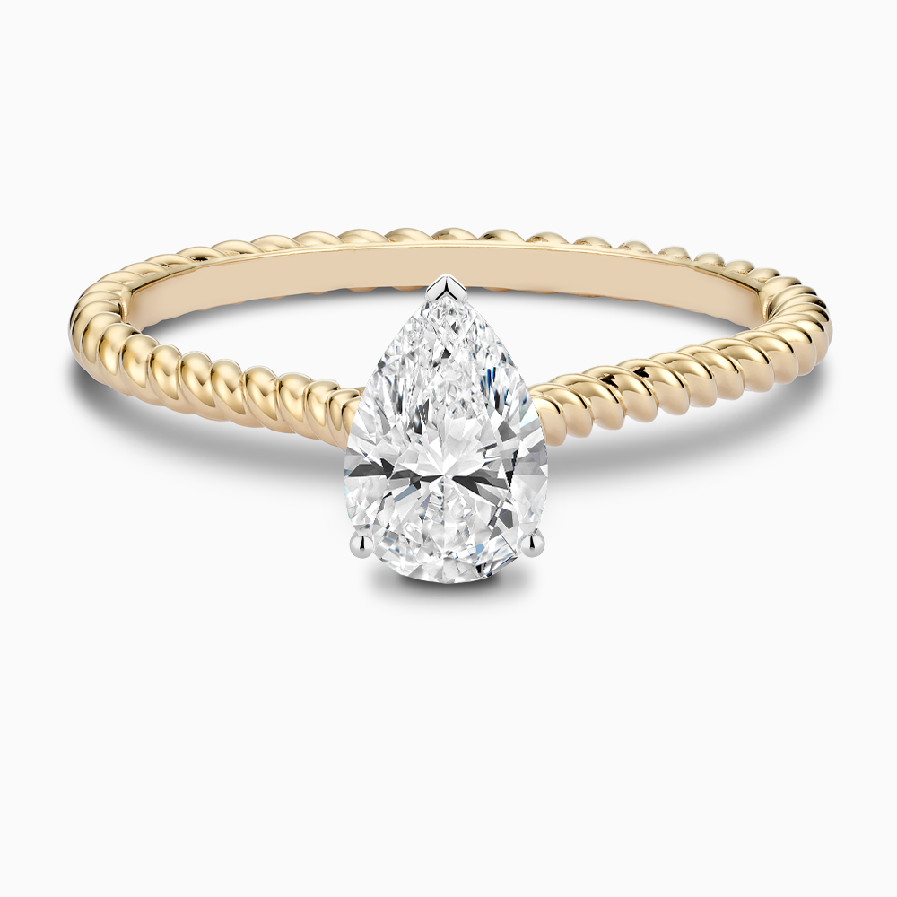 The Ecksand Twisted Diamond Solitaire Engagement Ring shown with Pear in 14k Yellow Gold