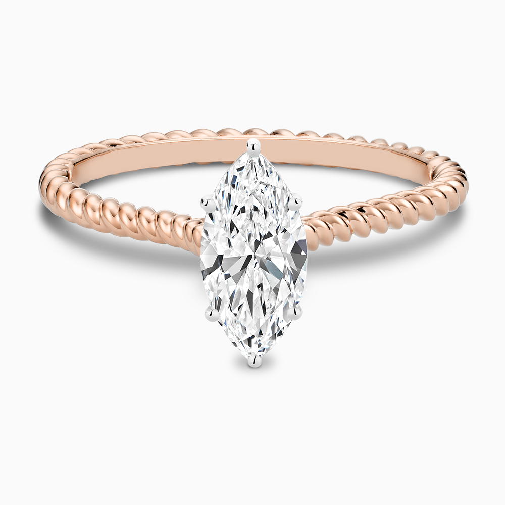 The Ecksand Twisted Diamond Solitaire Engagement Ring shown with Marquise in 14k Rose Gold