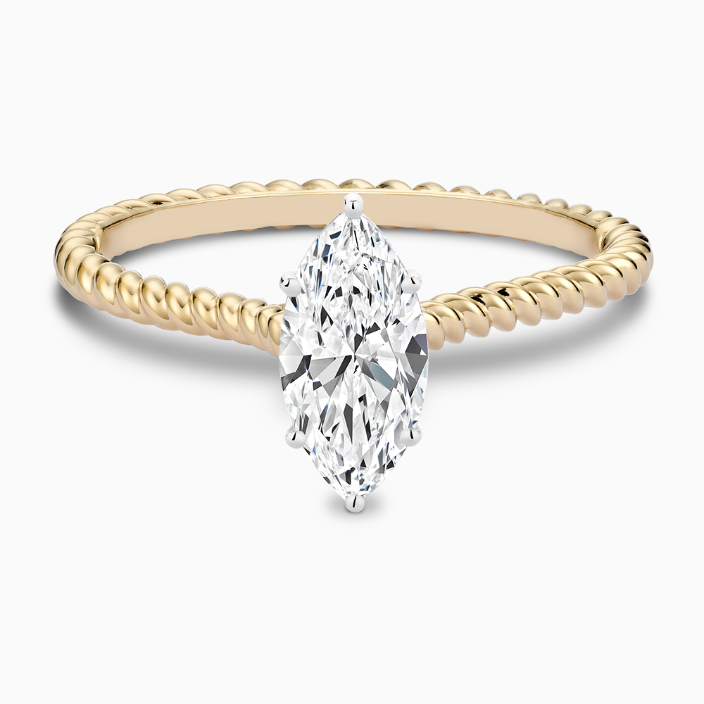 The Ecksand Twisted Diamond Solitaire Engagement Ring shown with Marquise in 14k Yellow Gold