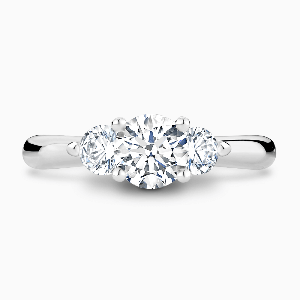 The Ecksand Three-Stone Diamond Engagement Ring with Twisted Prong Setting shown with Round in Platinum