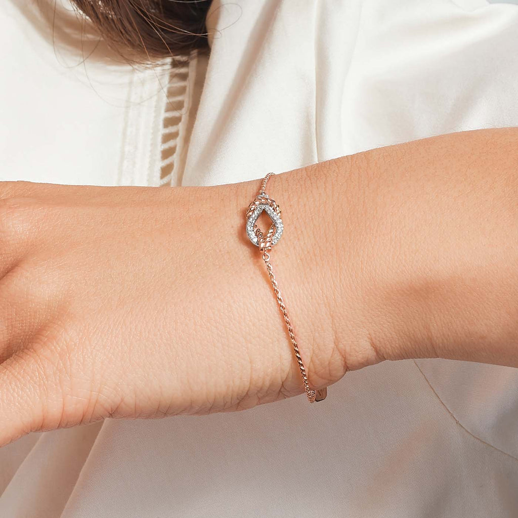 The Ecksand Twisted Gold Knot Bracelet with Diamond Pavé shown with  in 