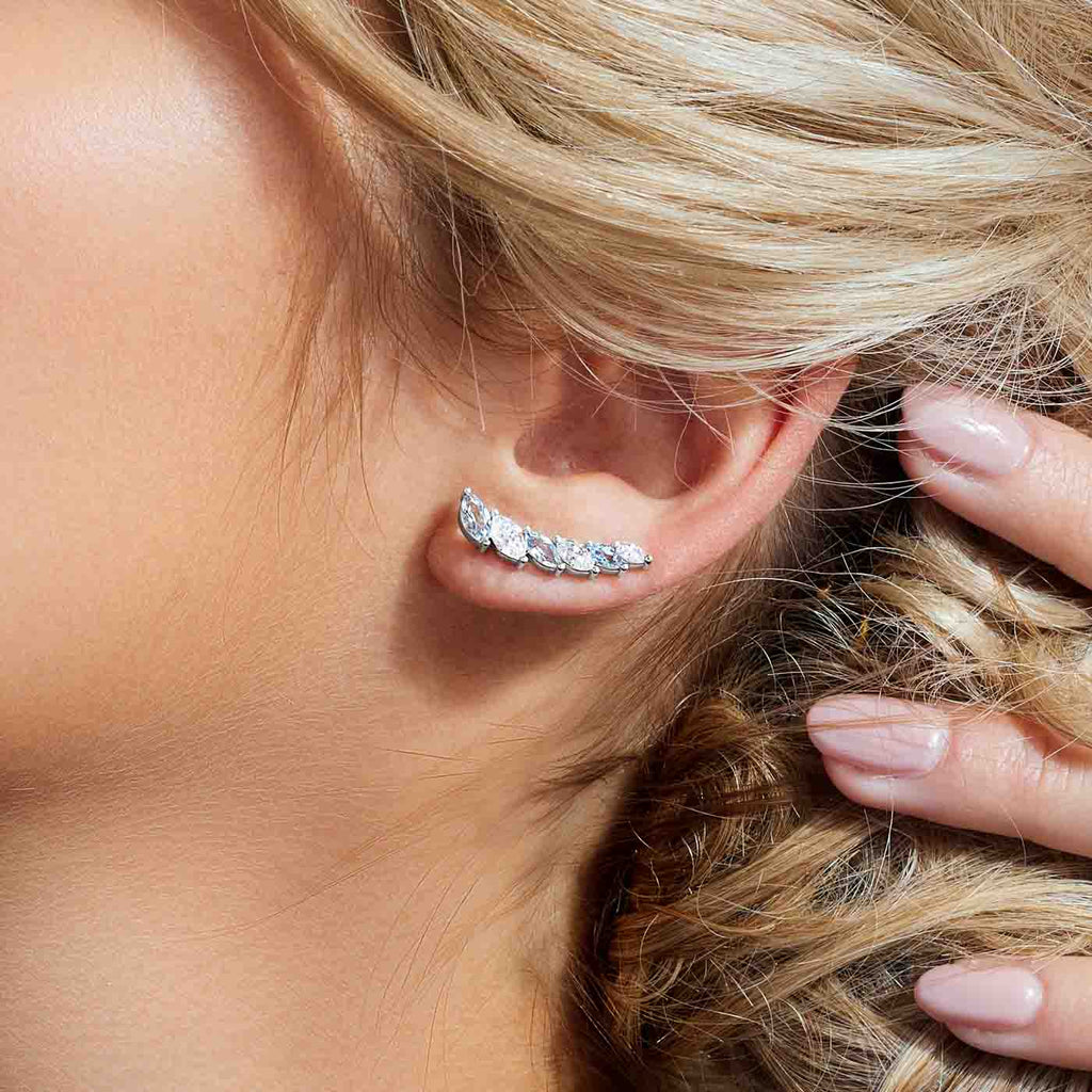 The Ecksand Asymmetrical Diamond and Aquamarine Crawler Earrings shown with  in 