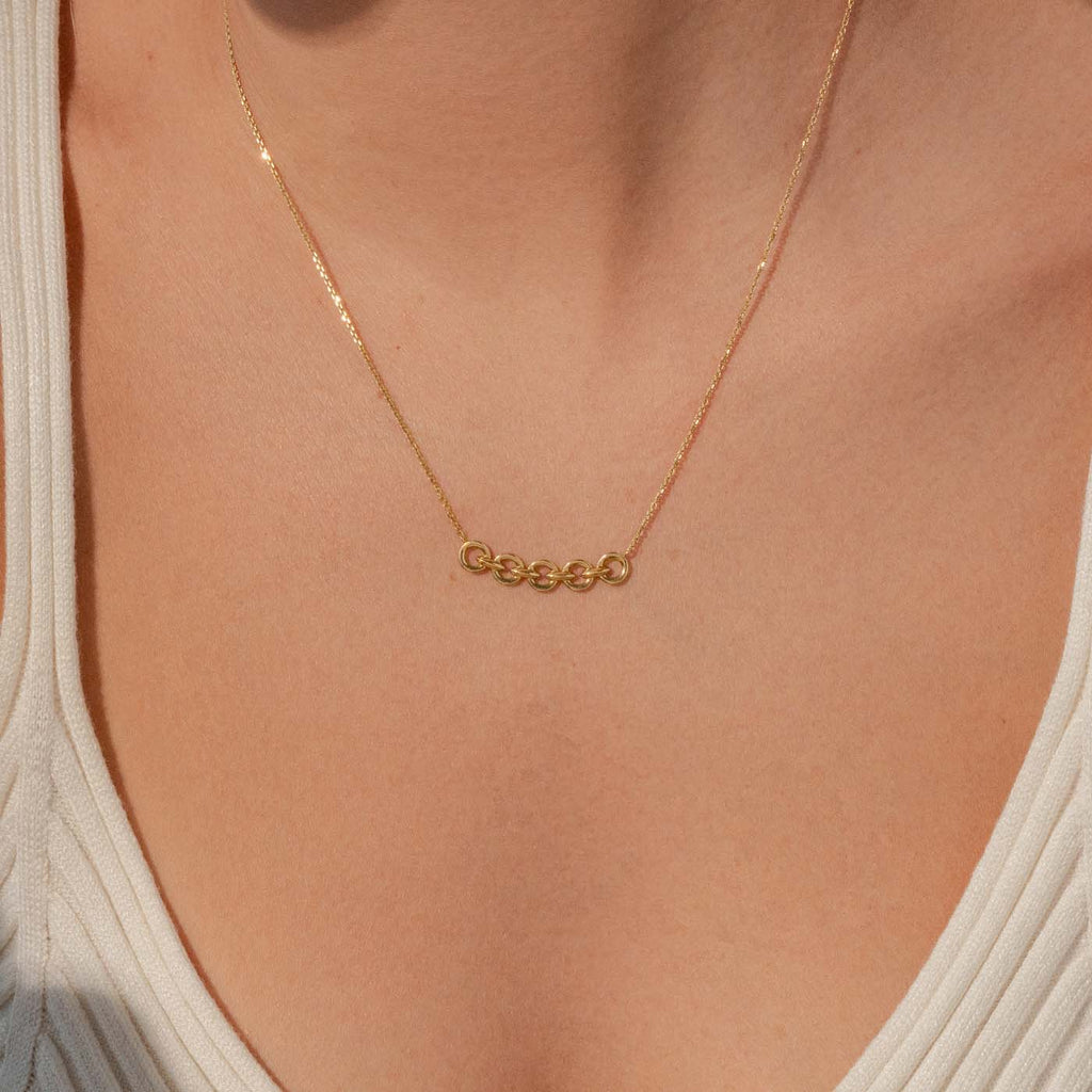The Ecksand Duel Gold Chain Necklace shown with  in 