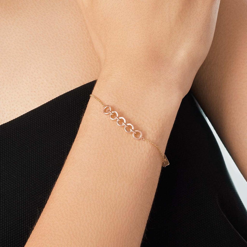 The Ecksand Duel Gold Chain Bracelet shown with  in 