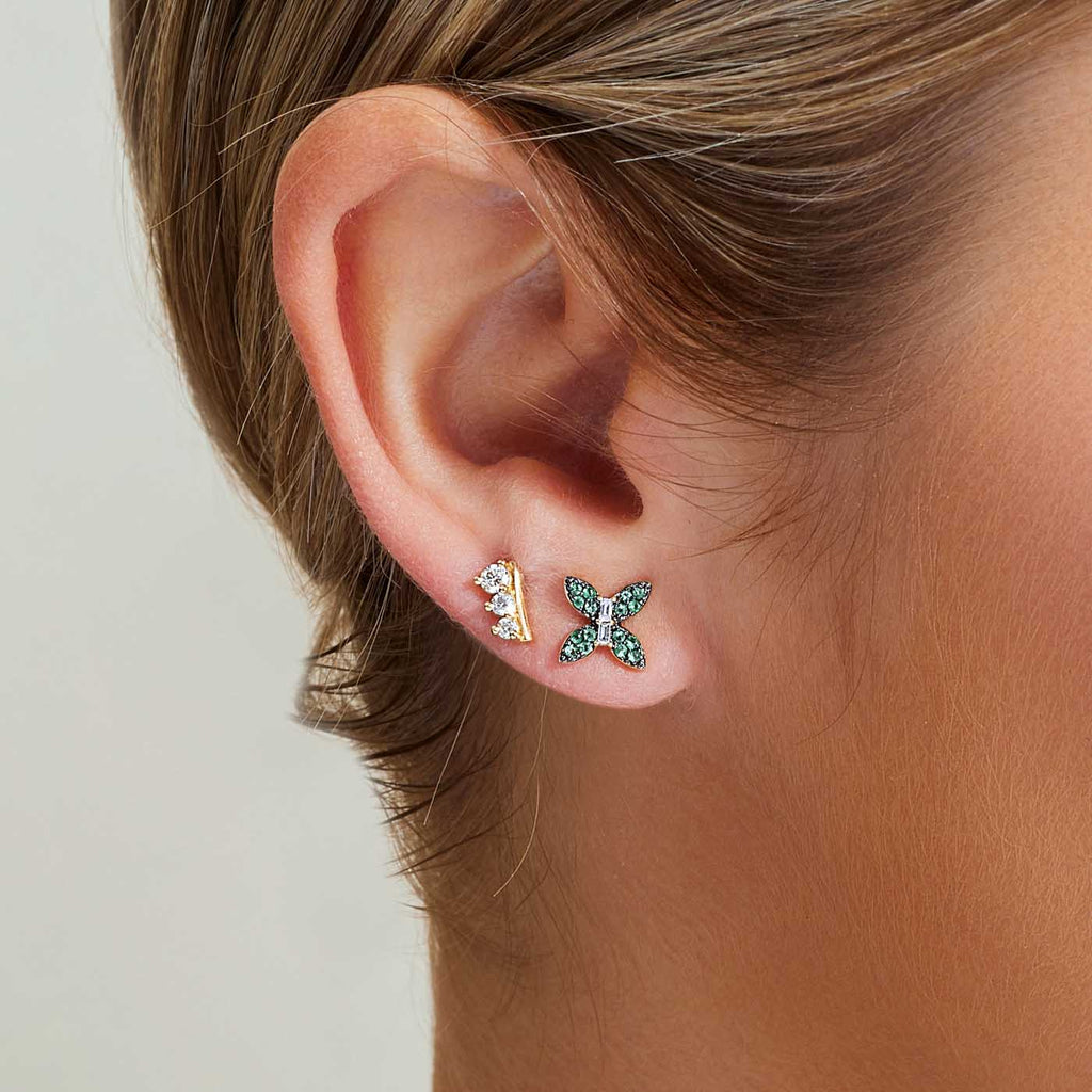 The Ecksand Asymmetrical Three-Diamond Stud Earrings shown with  in 