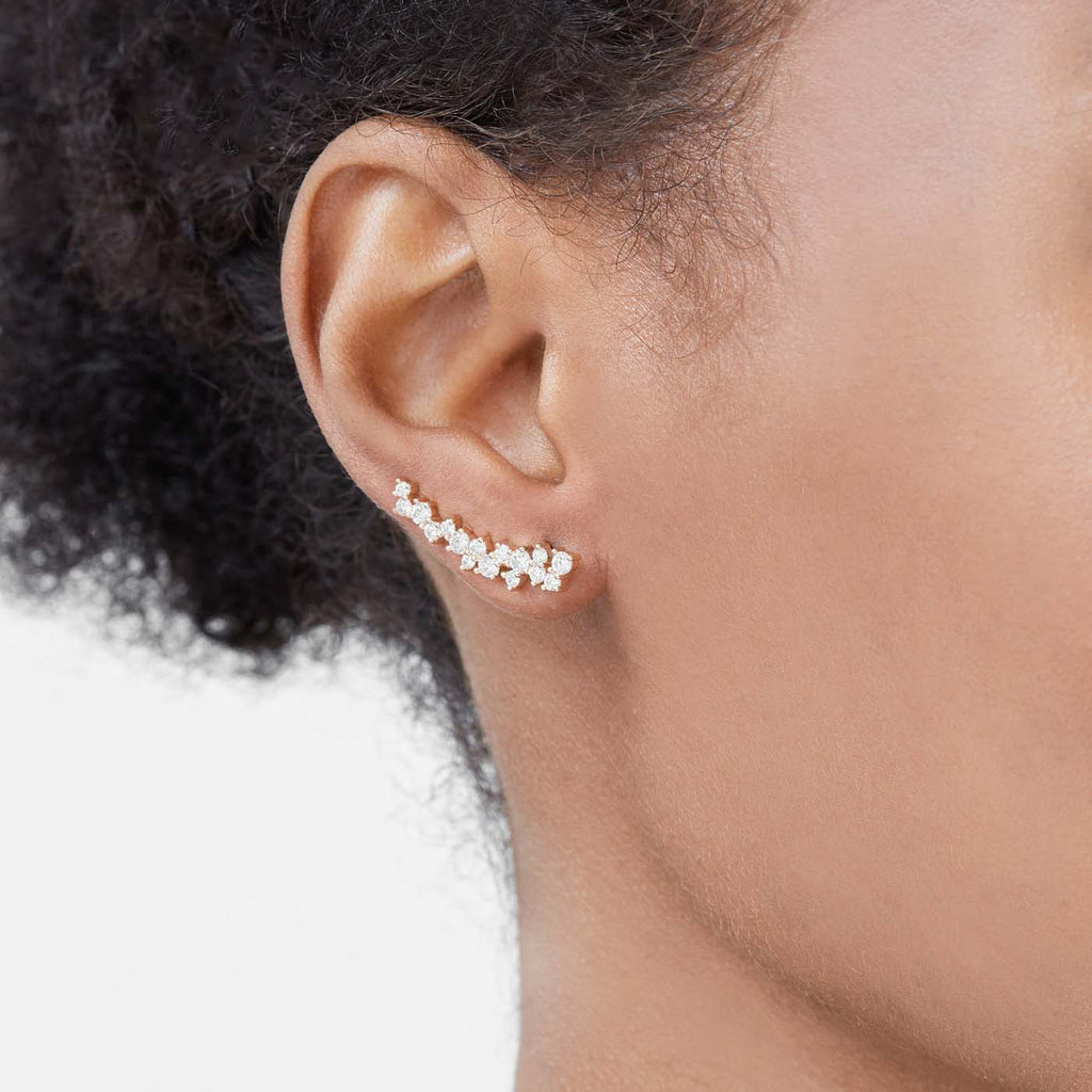 The Ecksand Asymmetrical Diamond Crawler Earrings shown with  in 